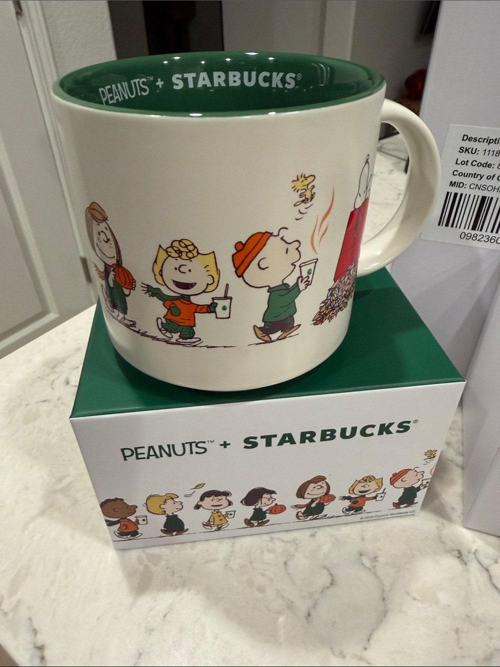 Starbucks snoopy Peanuts Holiday Mug in Cream and Green